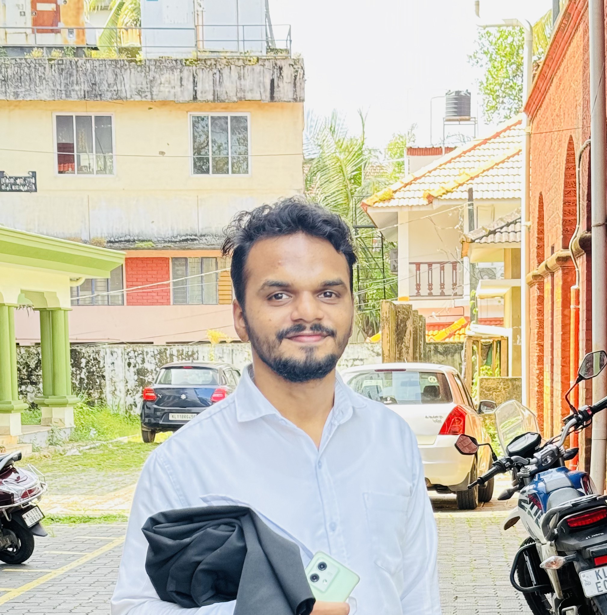 AMAL IHSAN K